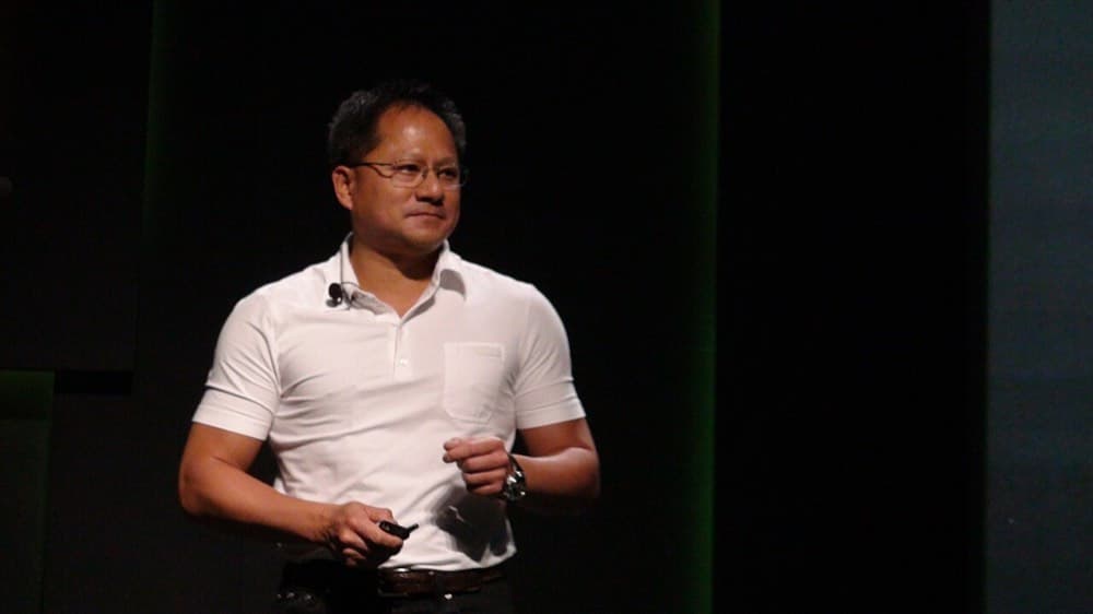 Jensen Huang Computex ko'rgazmasida (Taybey, 2010). Charm kurtka keyinchalik uning o'ziga xos belgisiga aylandi.
