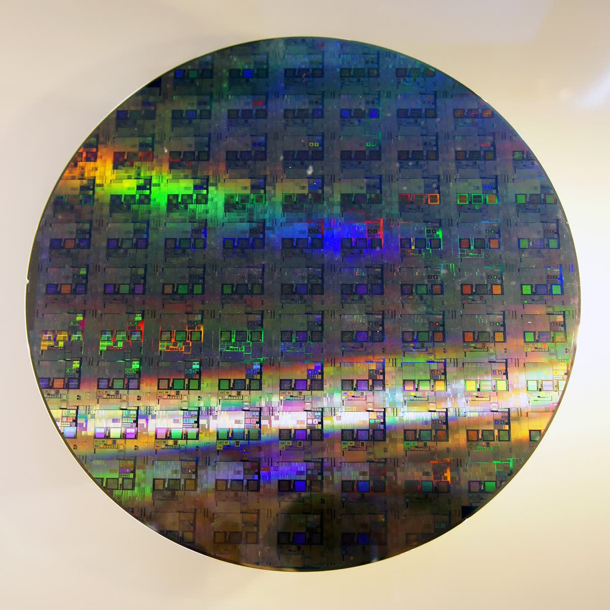 A silicon wafer — hundreds of chips are cut from one